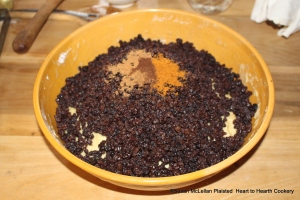 After the paste is risen for the receipt (recipe) A Good Cake: my first Cousen Clerkes Receipt worke in your fruit and spice. The fruit is plumped and dried currants and the spice-nutmeg, mace and cloves. 