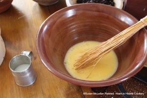 After the eight Eggs, half the Whites are beat for the receipt (recipe) A Boiled Plumb-Pudding then add half the Milk, beat them together.  A Pint of Milk is indicated for the full receipt but I am preparing half a receipt and used a half pint measure.