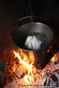 After the batter for the receipt (recipe) A Boiled Plumb-Pudding is tied in the pudding bag the receipt reads to boil it five Hours.  I prepared half the full receipt and after wrapping the string around the trammel tight to keep the pudding bag from touching the bottom of the kettle boiled the pudding for three hours.